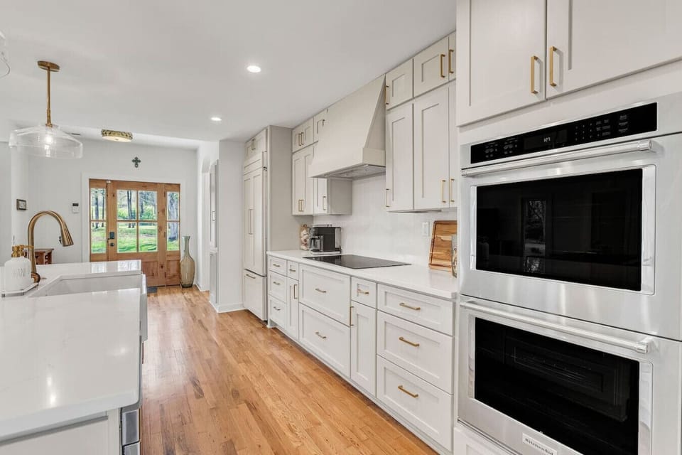 Gourmet kitchen with double oven for group cooking.