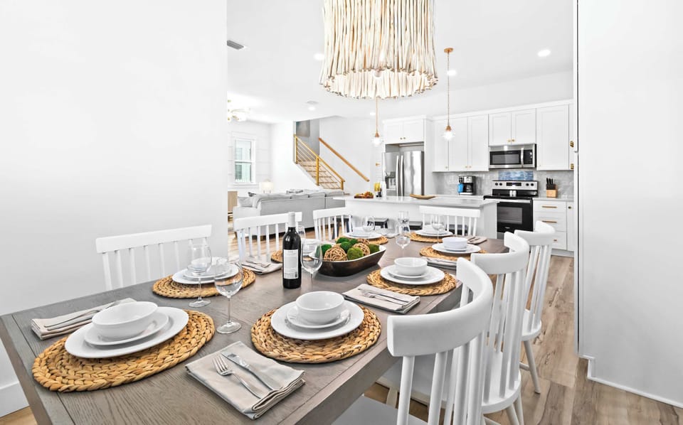 Dining area: 8-person dining table, open-concept layout