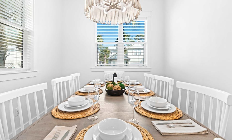Dining area: 8-person dining table, open-concept layout