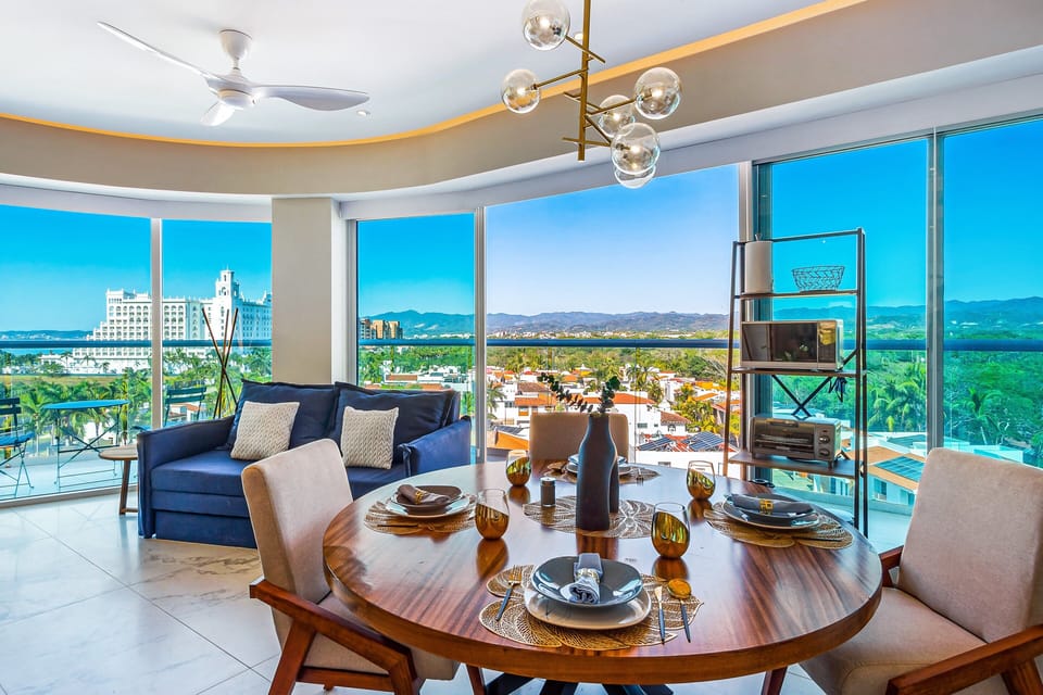 Modern open-concept living space with elegant décor, comfortable seating, and panoramic views that bring the outdoors in.