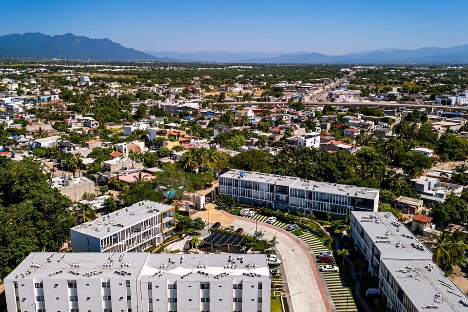 Ideally located near shopping, dining, and local attractions, this modern community offers easy access to everything you need while showcasing beautiful mountain views and the vibrant surroundings of Nuevo Vallarta.
