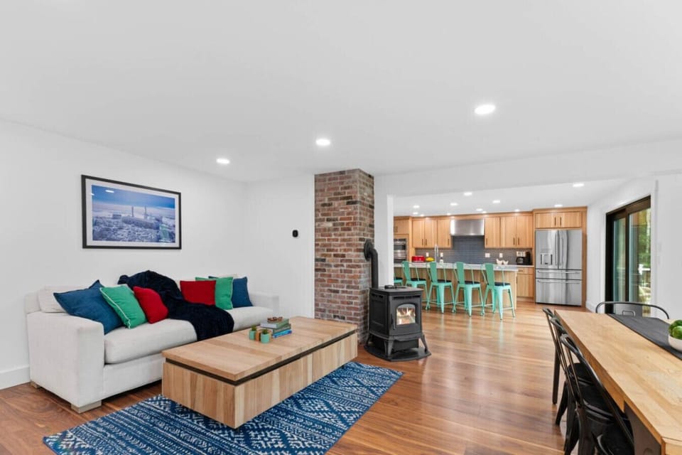 Our bright, open concept living area seamlessly connects the kitchen and lounge. Whether you`re prepping a meal at the kitchen island or relaxing by the fireplace, you`ll never feel far from the fun.
