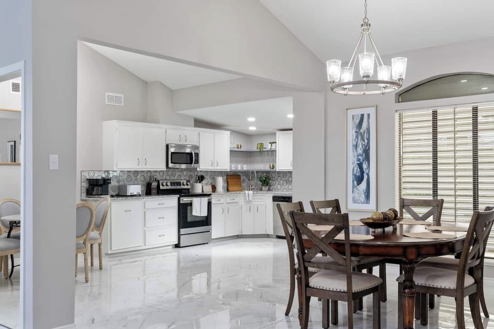  Fully equipped kitchen with stainless steel appliances and ample cabinet space.
