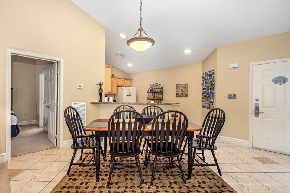 Gather around this welcoming dining space where family meals and memories come together beautifully.