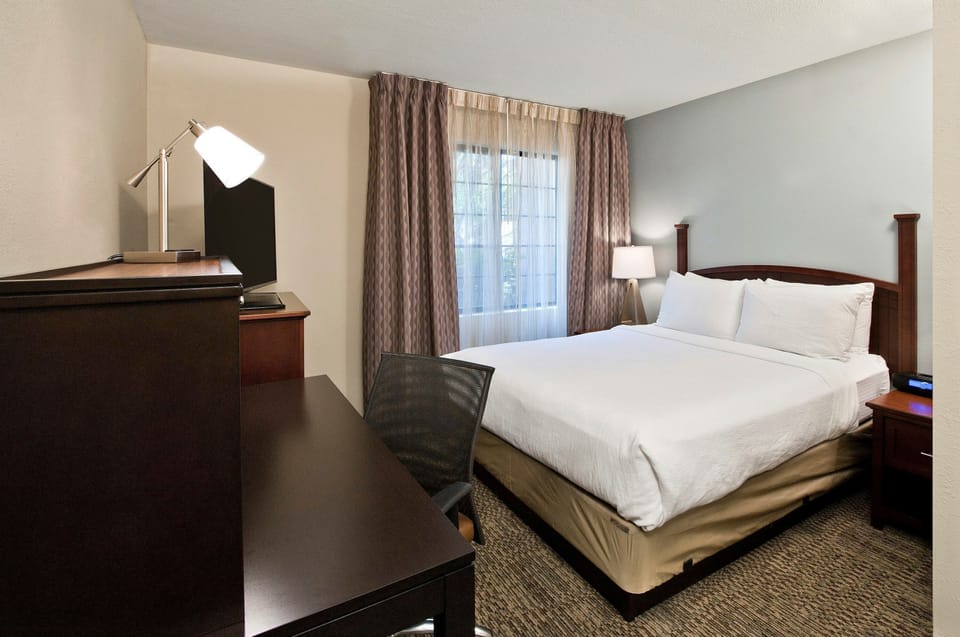 Relax on the comfy queen bed after a day outside.