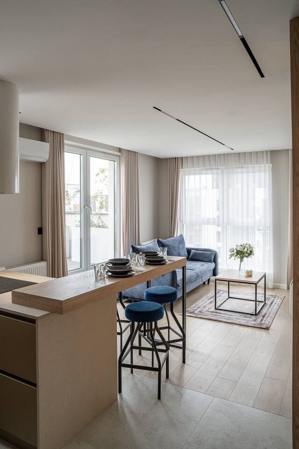 Bright Living Area with Sofa, Smart TV and Access to Private Terrace | Book Now with RENTUJEMY.COM