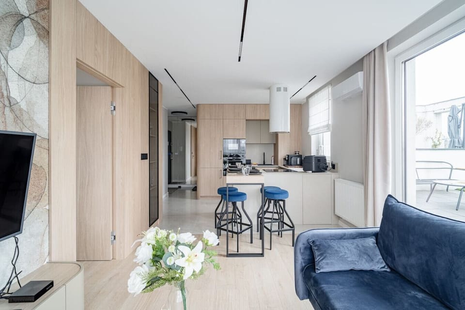 Bright Living Area with Sofa, Smart TV and Access to Private Terrace | Book Now with RENTUJEMY.COM