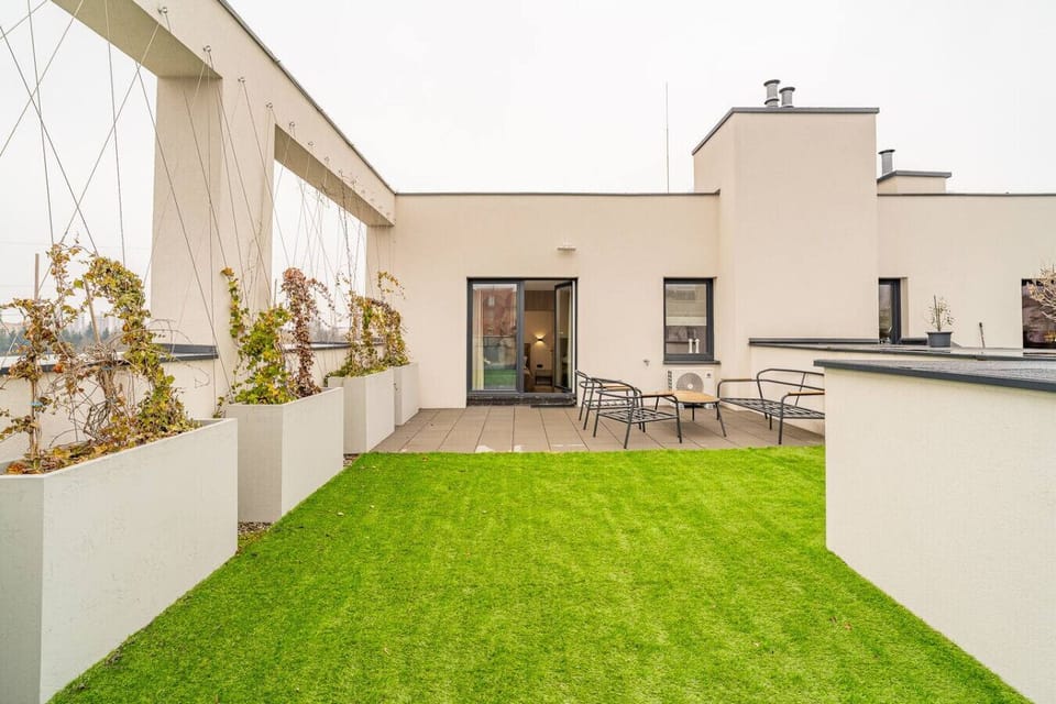 Spacious Private Terrace with Garden, Outdoor Seating and City Views | Book Now with RENTUJEMY.COM