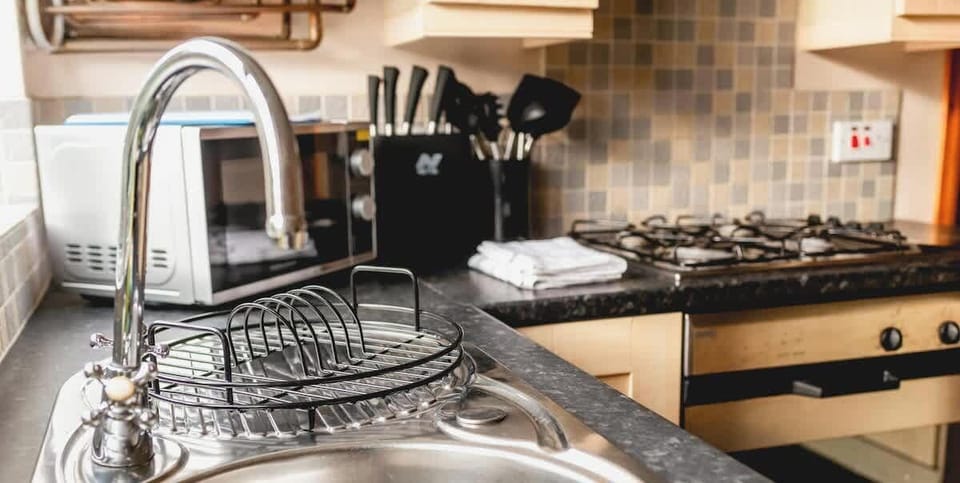 Kitchen at Escape & Estates Serviced Accommodation & Short Lets 			