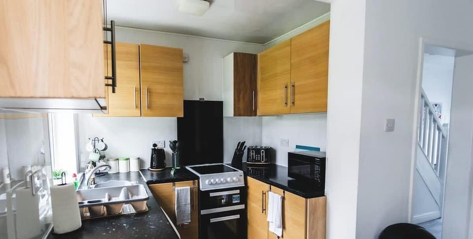 Kitchen at Escape & Estates Serviced Accommodation & Short Lets 			