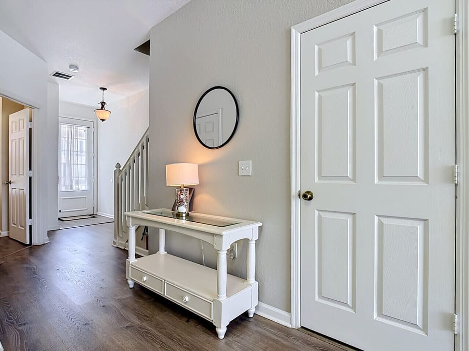 Bright entry area with hallway view and clean interior design.