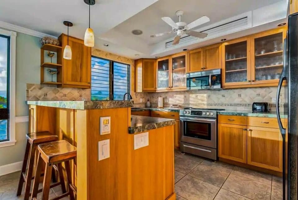 Beautifully designed full kitchen with bar seating!