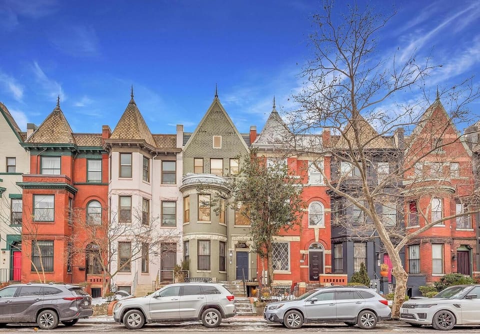 Classic DC rowhouse facade on a tree‑lined street, just steps from the energy of U Street.