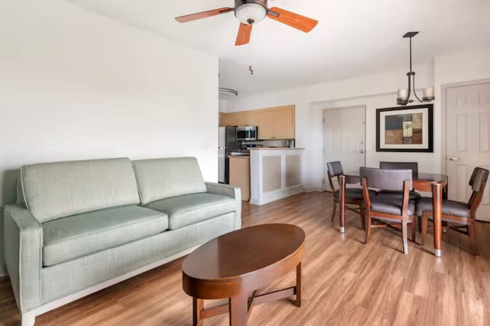 Drift off comfortably beneath a ceiling fan and soft light.