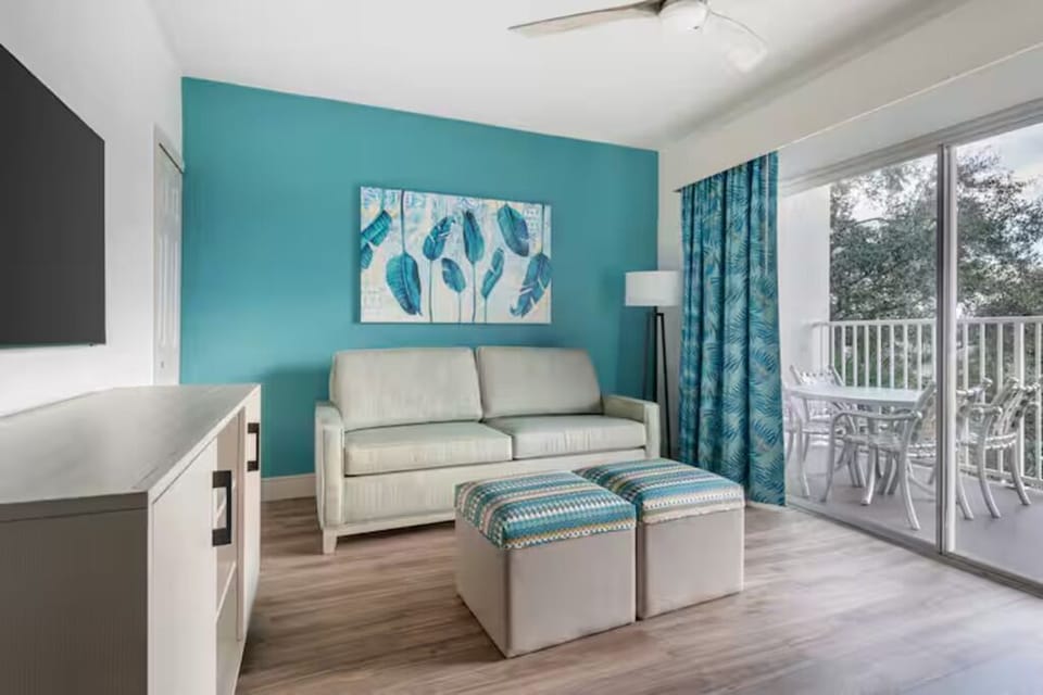 Lounge in airy comfort steps from your private balcony.