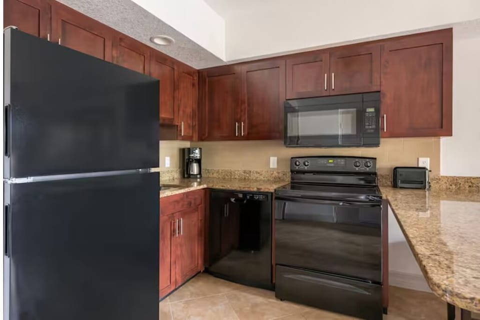 Cook up easy meals with full appliances and ample counters.