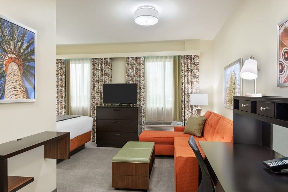 Stretch out in the spacious suite with lounge seating and desk.
