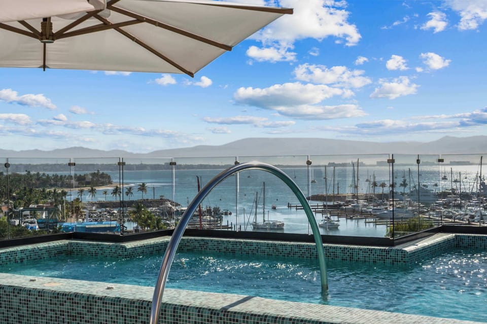 Rooftop pool with marina views 