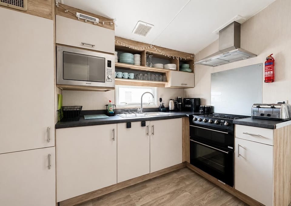 This kitchen comes with all the basic cooking and dining equipment you will need to prepare the family favourites.
