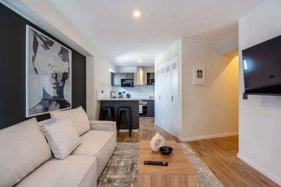 Comfortable living room setup featuring a smart TV and inviting seating area.
