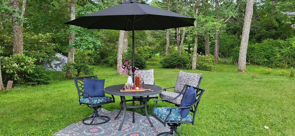 We have Several outdoor tables to you around the property.