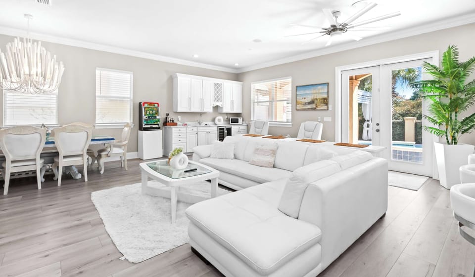 Living room: 85" Smart TV, open-concept lounge, main floor