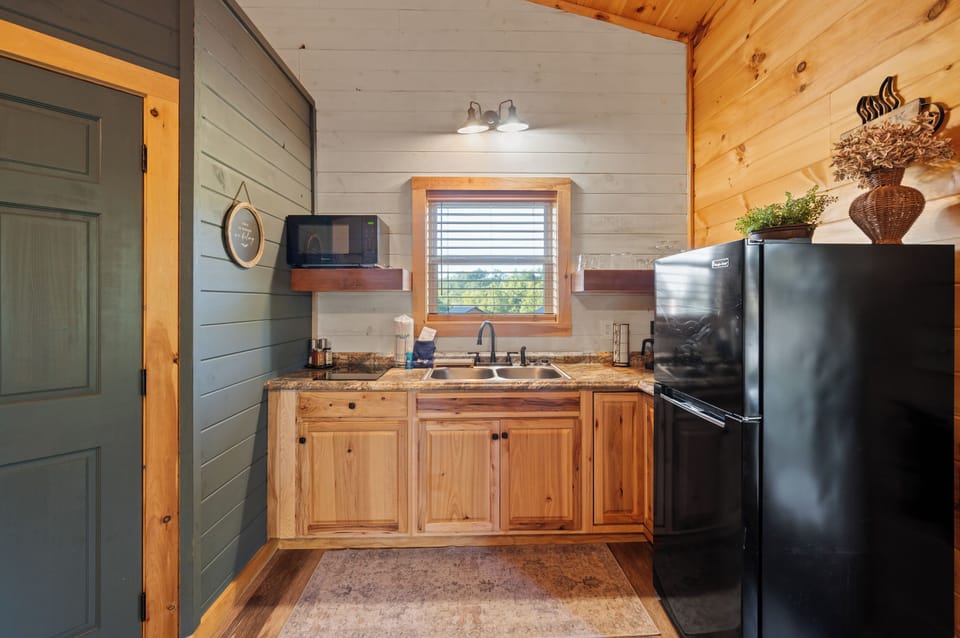 Compact kitchen setup with everything you need to cook and store meals