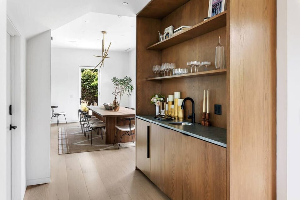 Elegant hallway leading to the dining area, creating a seamless flow through the home.