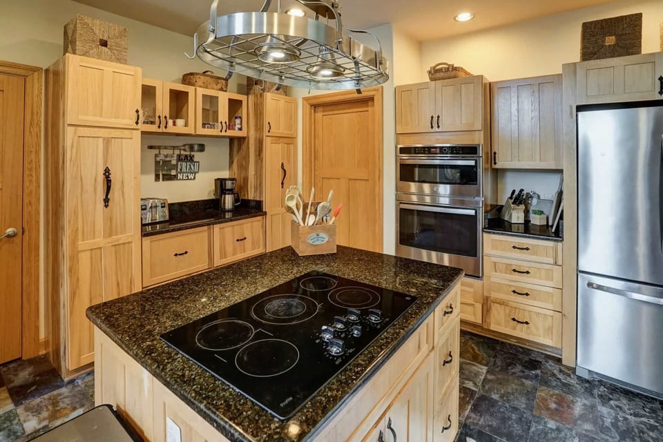 Cook Together - The open kitchen layout keeps the chef in the conversation no matter how the evening unfolds.