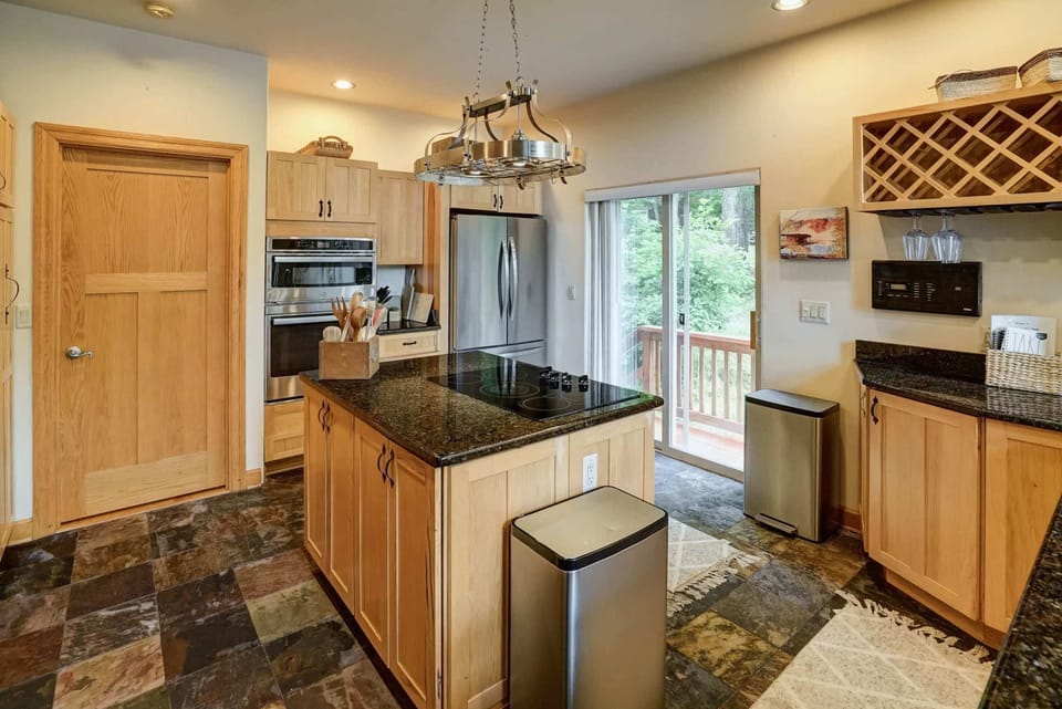 Bright and Inviting - Clean lines, quality appliances, and plenty of prep space make every meal a pleasure.