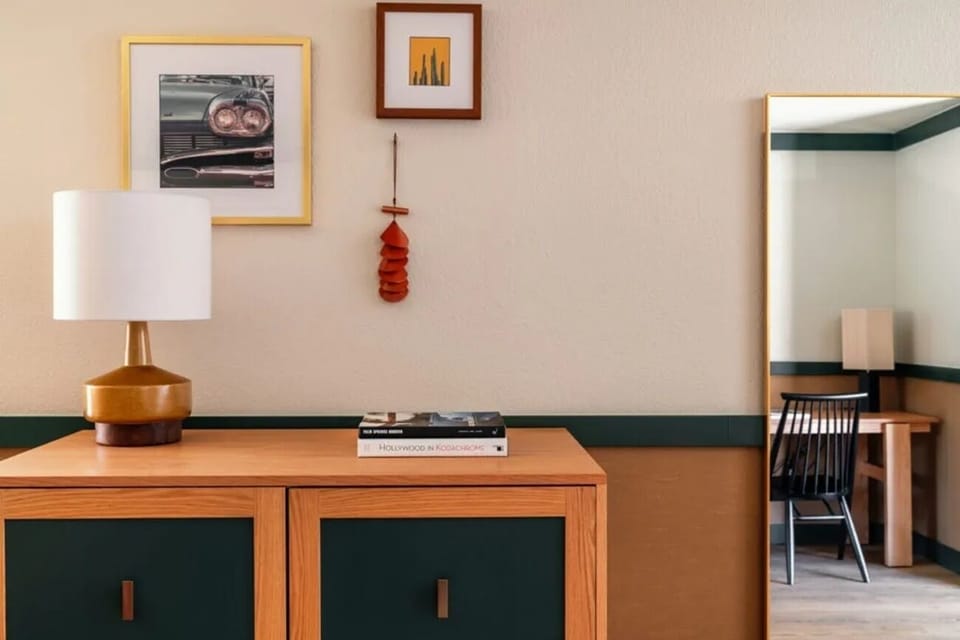 Enjoy thoughtful touches with stylish storage and reading lamp.