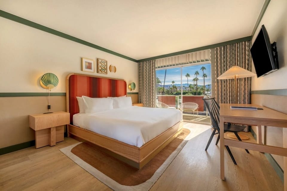 Wake up to sunlit comfort and soothing balcony views.