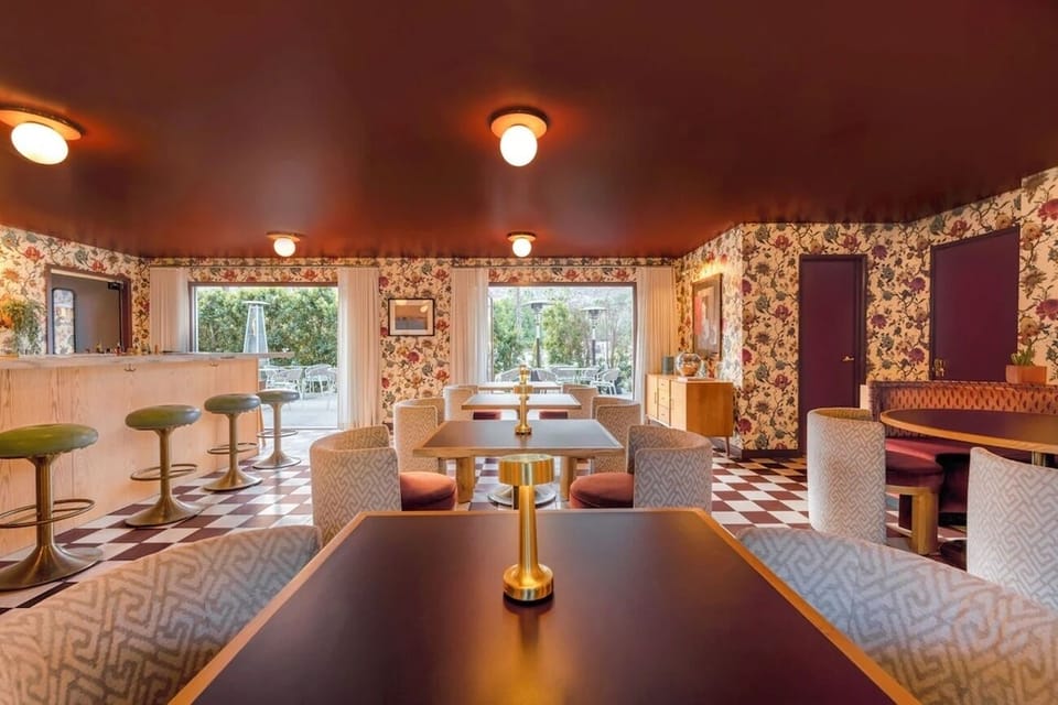 Stretch out in the airy dining room with garden views.