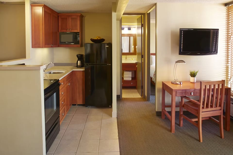 Cook easy meals in the kitchenette, then unwind at the desk.