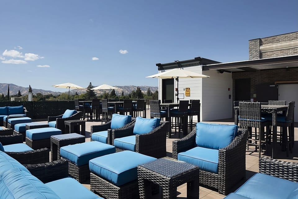 Unwind in sunny rooftop lounges with sweeping mountain views.