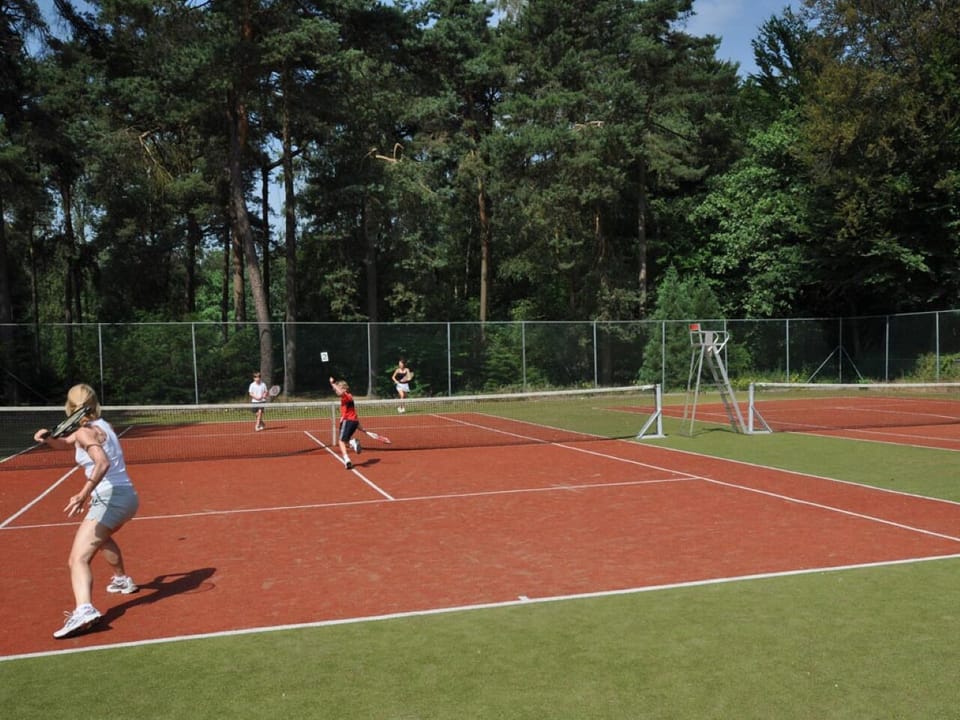 Serve, rally, and compete on the on-site tennis courts.