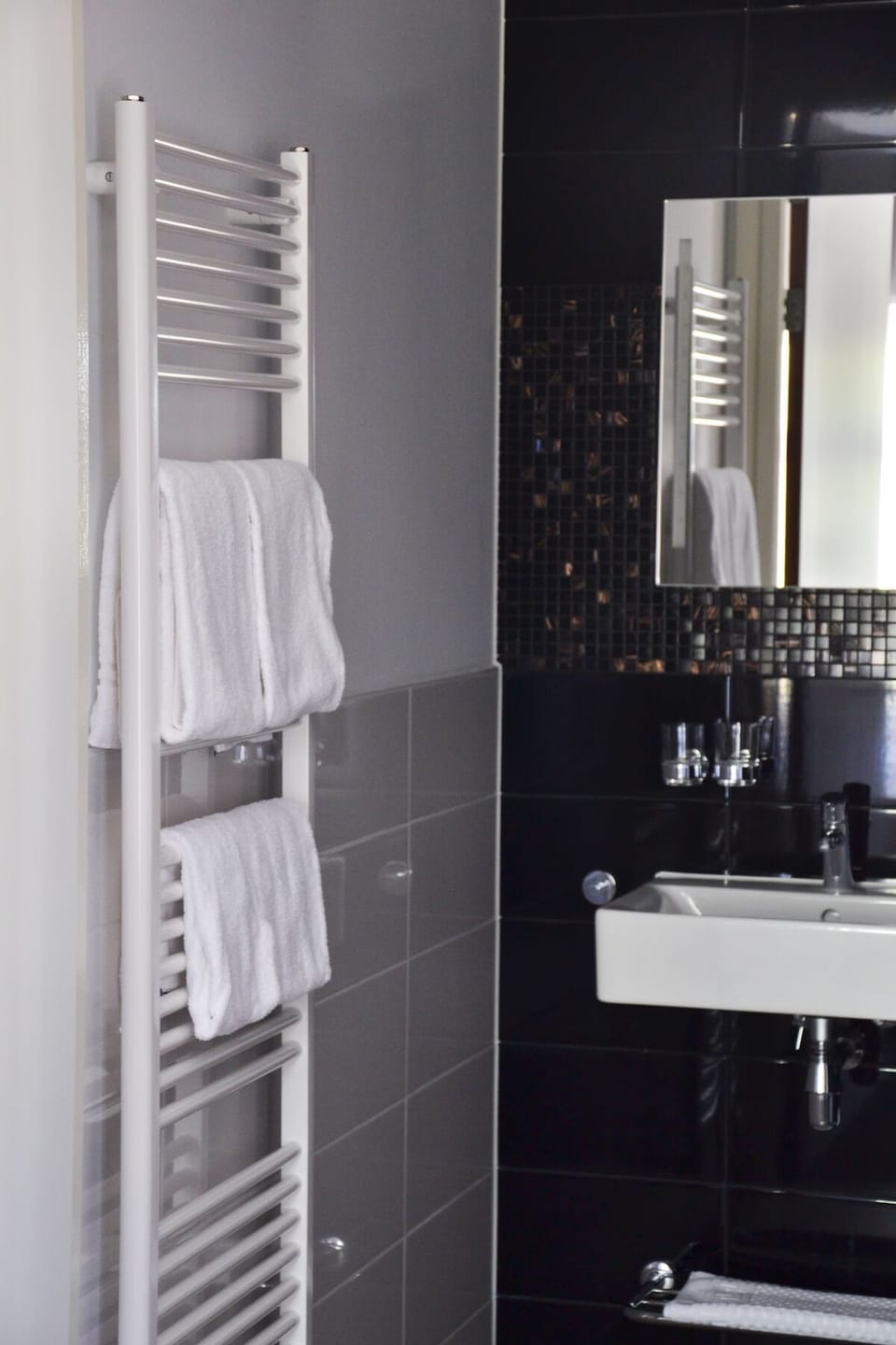 Refresh with fluffy towels and a sleek, modern vanity.