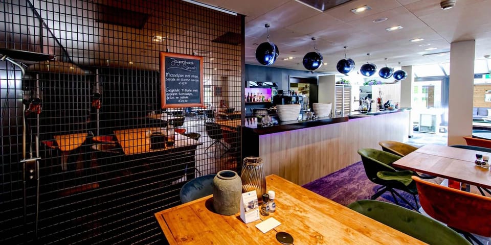 Gather for casual bites in the bright, modern dining space.