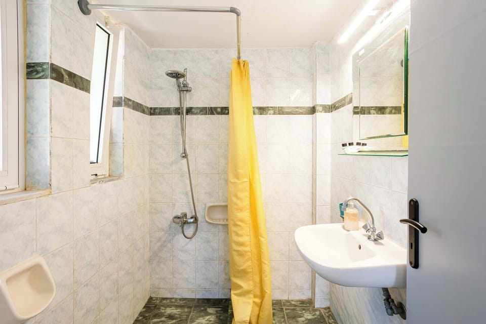 Bathroom with Shower and Curtain Divider