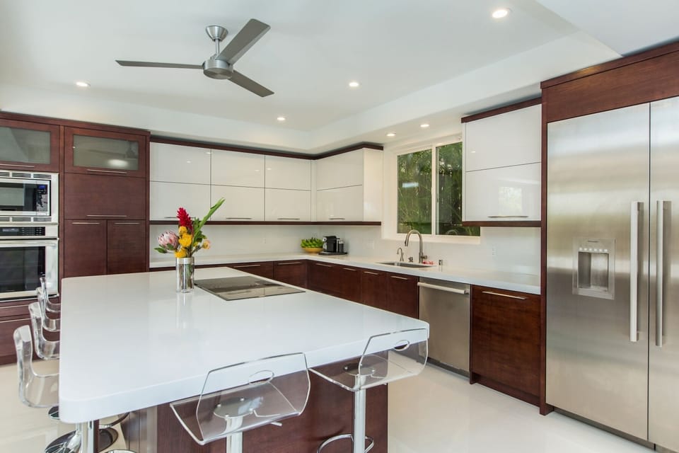 State-of-the-art kitchen with island seating—perfect for casual bites or gourmet prep.