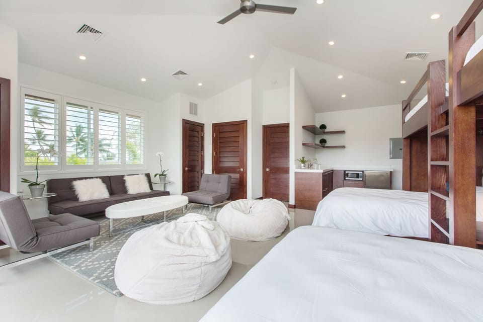 Bunk room with bean bags, beds, and space to stretch out and relax.
