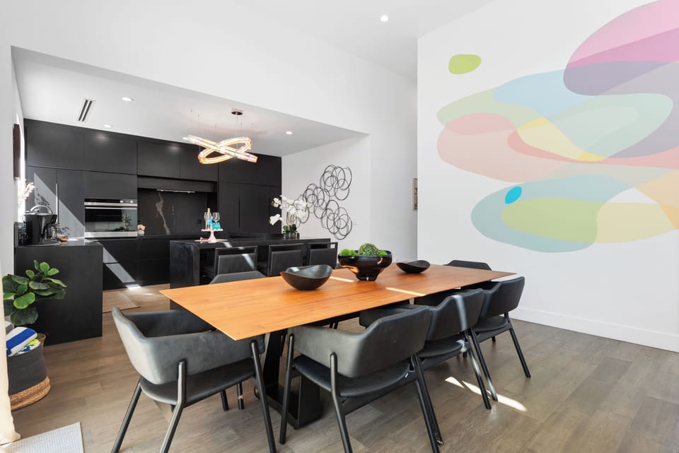 Dining for 8 in our bright open layout next to the kitchen.