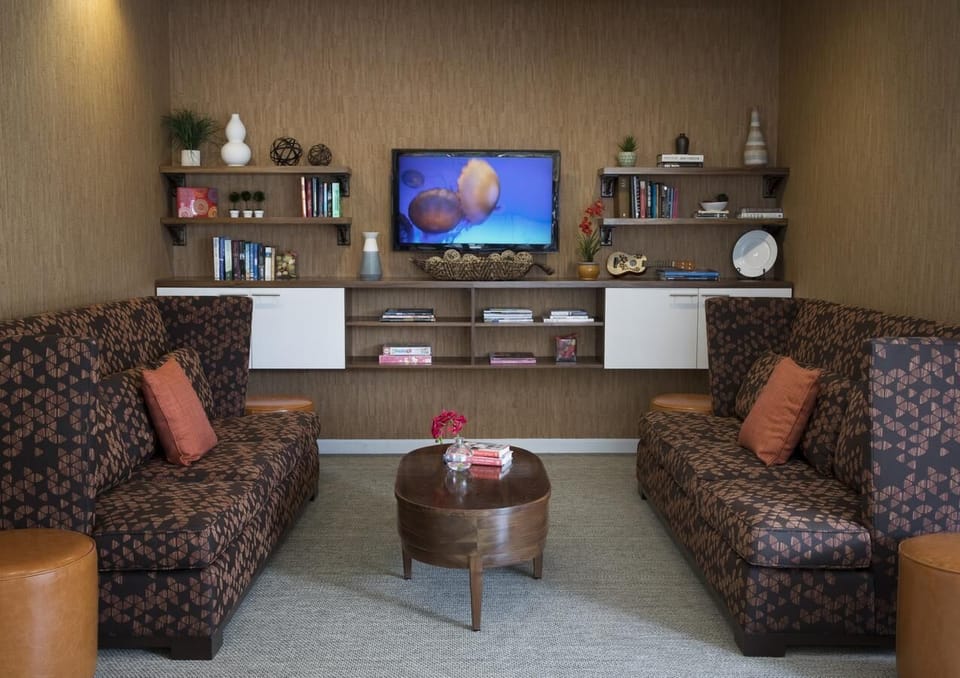 Settle in with a movie night on plush, quiet sofas.