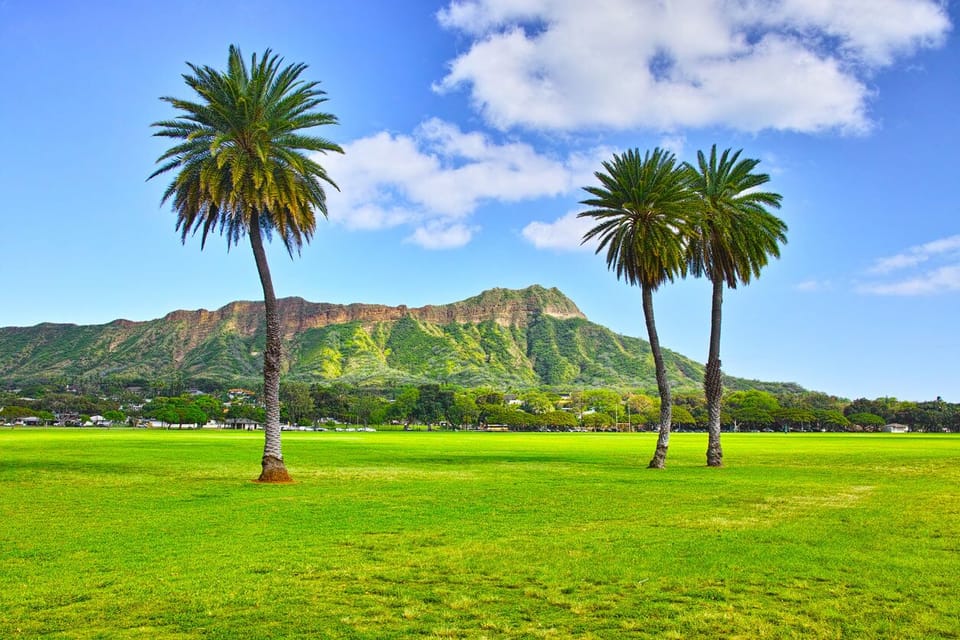 Breathe in wide-open green space with iconic mountain backdrops.