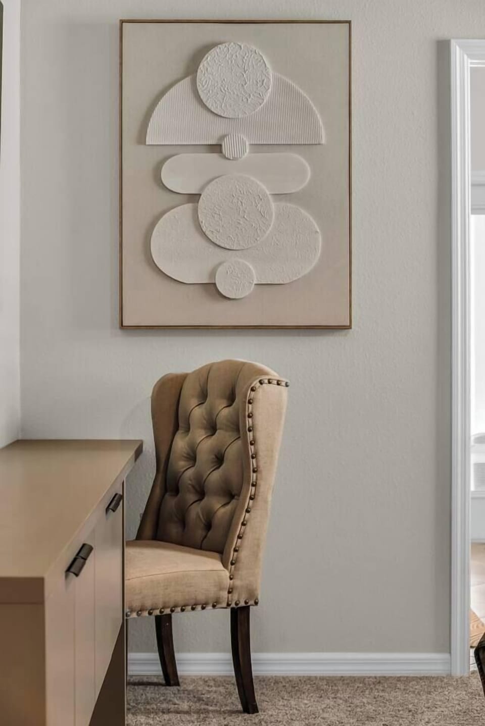 Plush tufted headboard adds a soft, elegant touch to the bed.