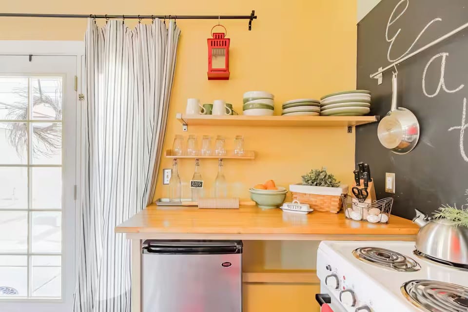 Tuck under refrigerator. Extra freezer/ refrigerator in the garage for guests.