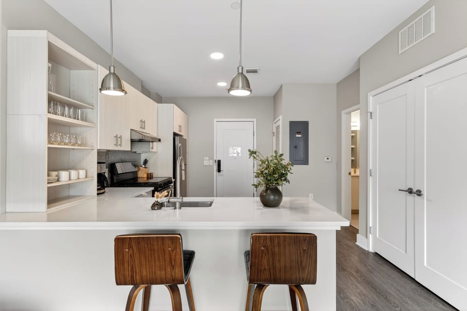 Gourmet kitchen with barstools.