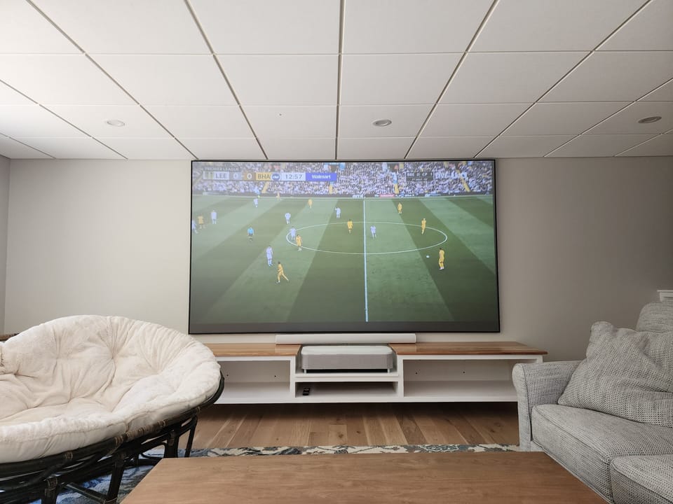 120" projector in Game Room (Basement Living Room)