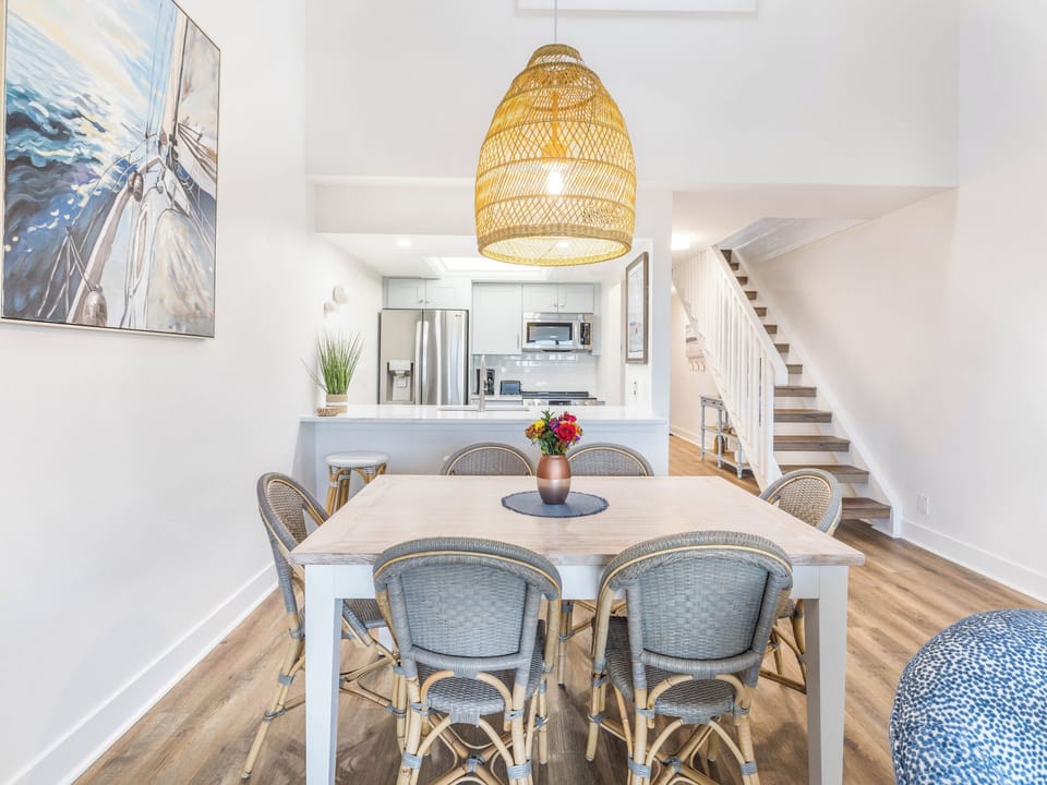 Plan tomorrow’s adventures around the spacious, beachy dining table.