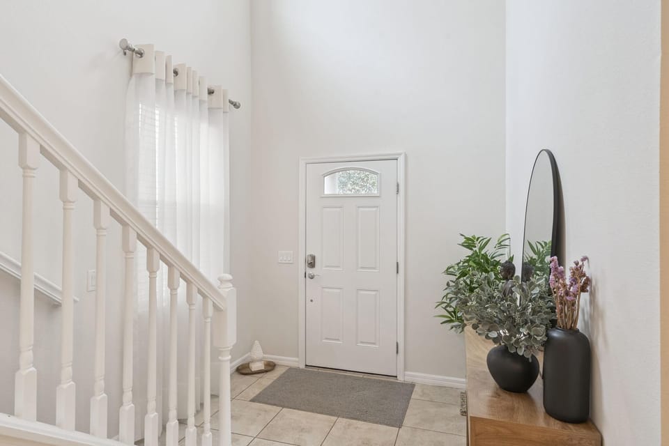 Bright and airy entryway with modern farmhouse charm